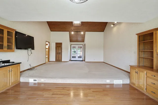 a view of a swimming pool with a patio