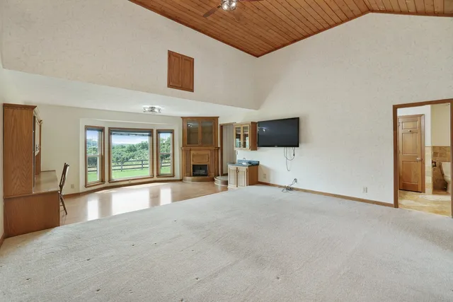 a view of a swimming pool with a patio
