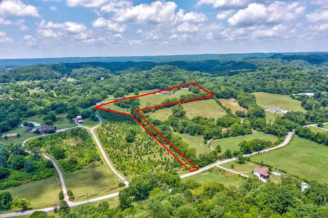 a view of a lake with a big yard