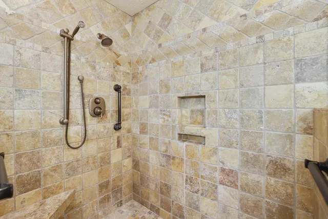 an aerial view of a house with outdoor space pool seating area and yard