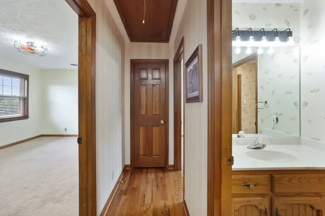 a view of a lake with a yard