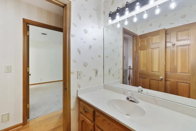 a view of a lake with a yard