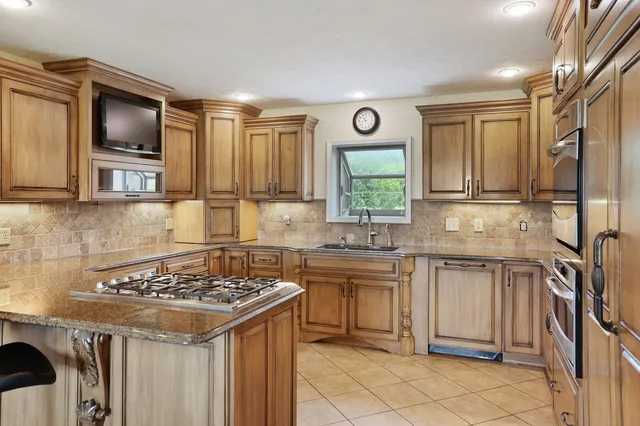 a view of a livingroom with furniture window and outside view