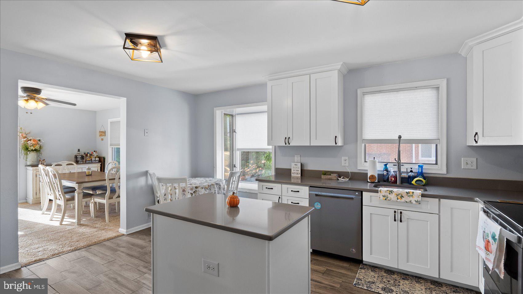 9905 Magledt Road Baltimore, MD 21234 - Photo 15 of 45 a kitchen with appliances a sink and cabinets