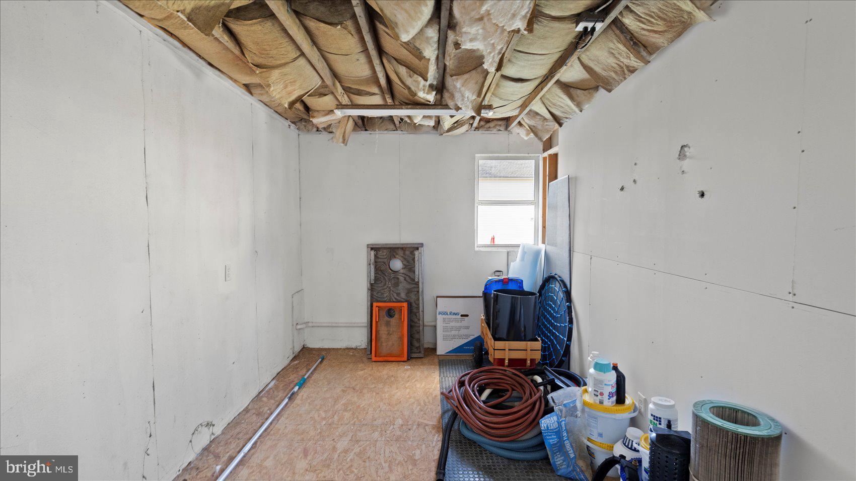 9905 Magledt Road Baltimore, MD 21234 - Photo 36 of 45 a view of storage and utility room with a window