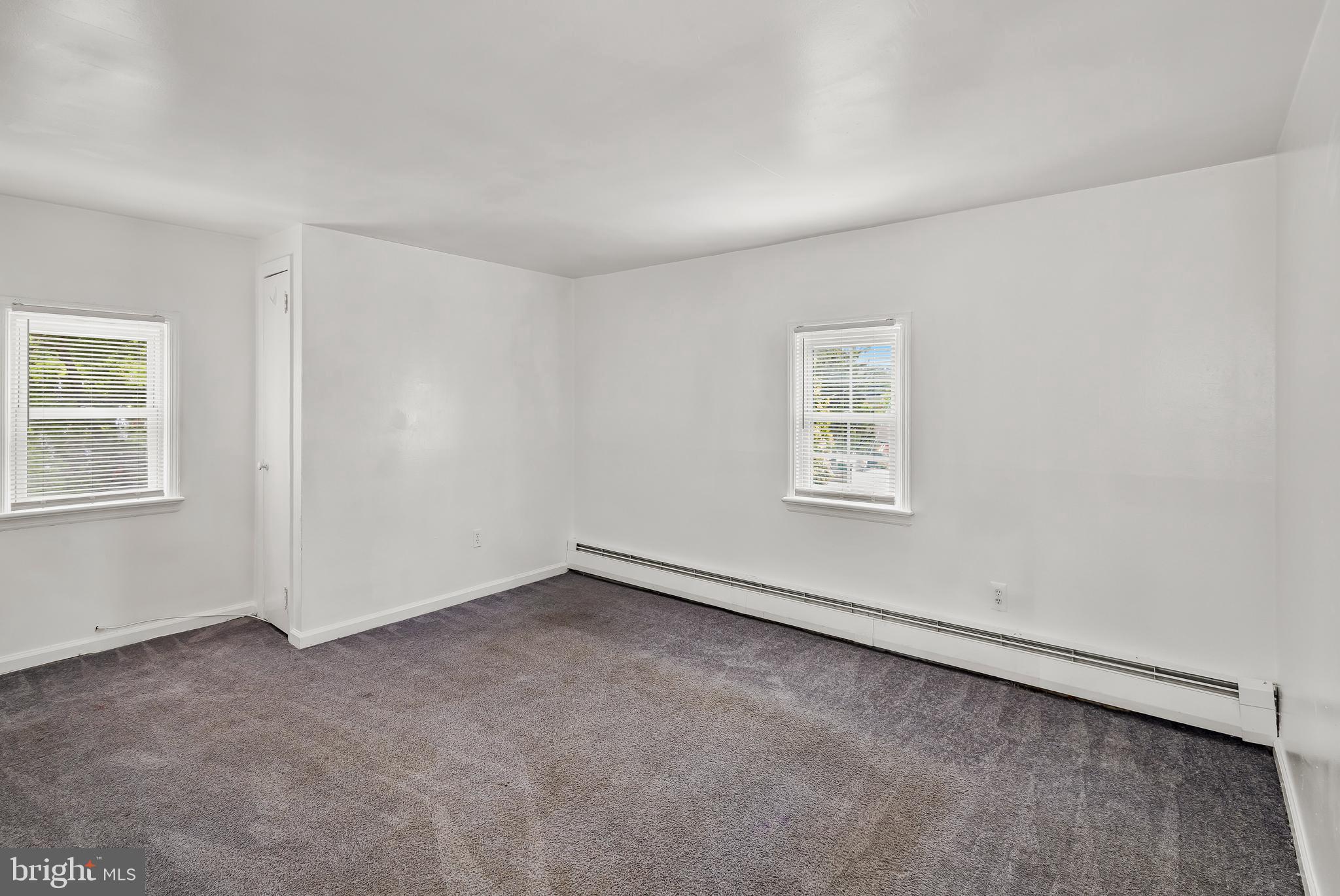 505 West Evesham Road, Unit B Glendora, NJ 08029 - Photo 5 of 10 an empty room with a empty space and a window