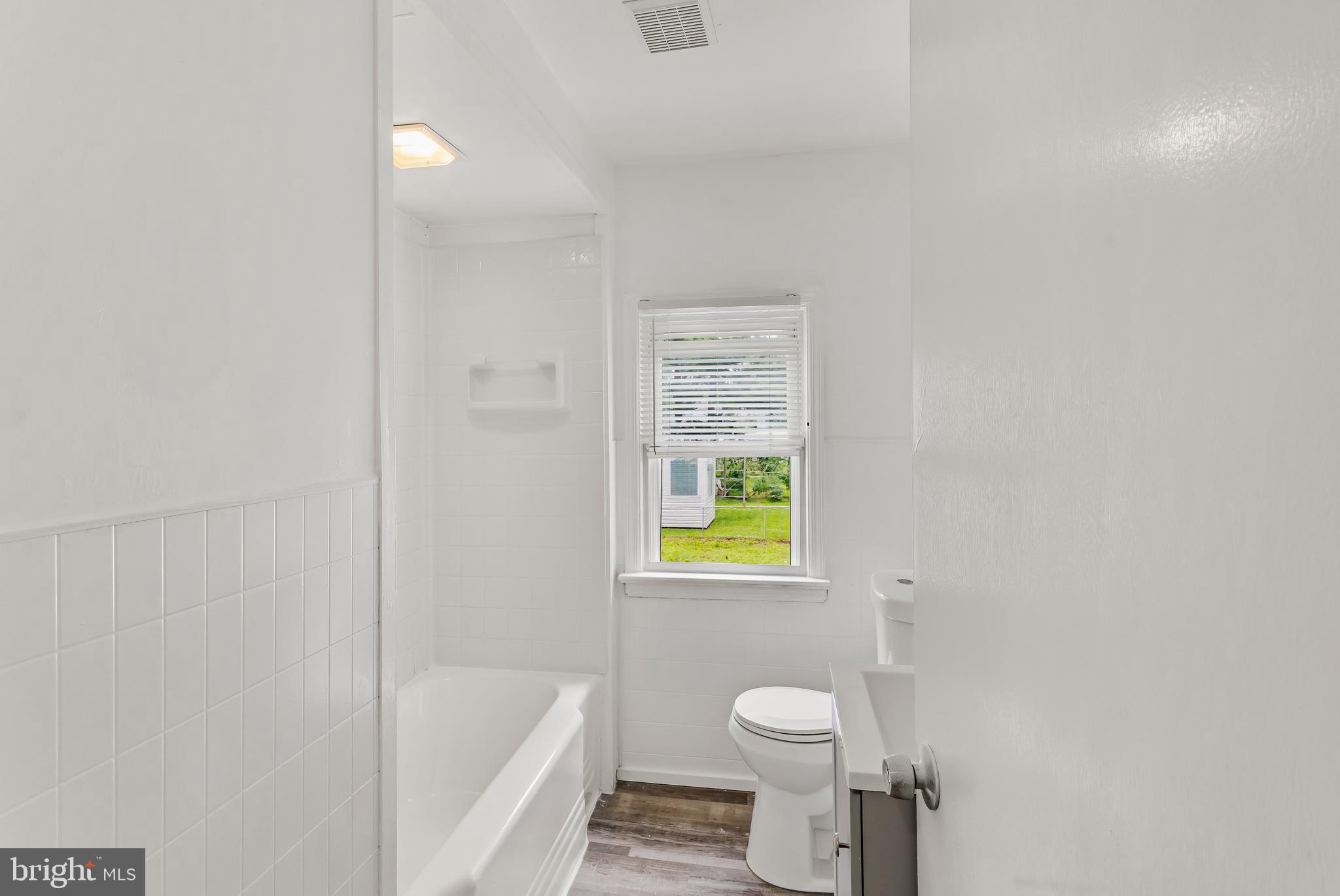 505 West Evesham Road, Unit B Glendora, NJ 08029 - Photo 7 of 10 a bathroom with a toilet and a bathtub