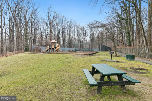 a view of a park with swings