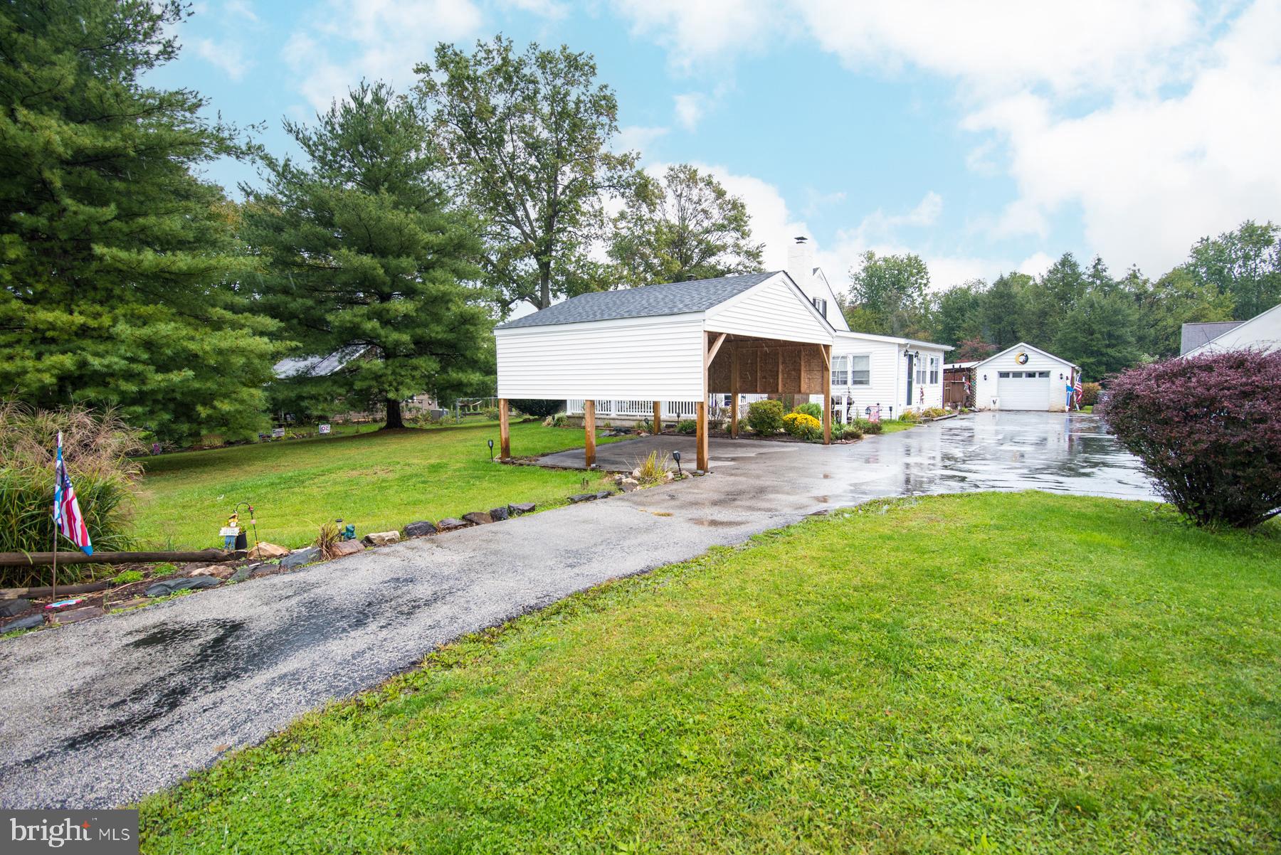 906 Township Line Road Phoenixville, PA 19460 - Photo 31 of 41 Driveway with carport for 2 cars