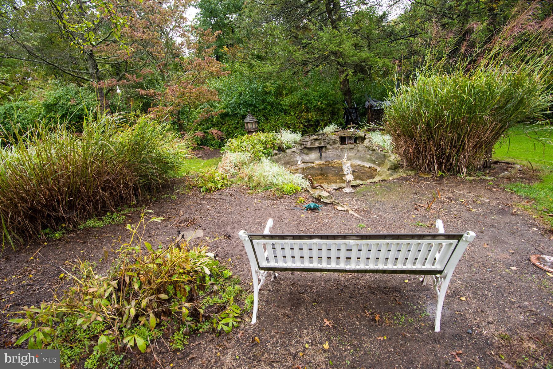 906 Township Line Road Phoenixville, PA 19460 - Photo 35 of 41 Backyard pond