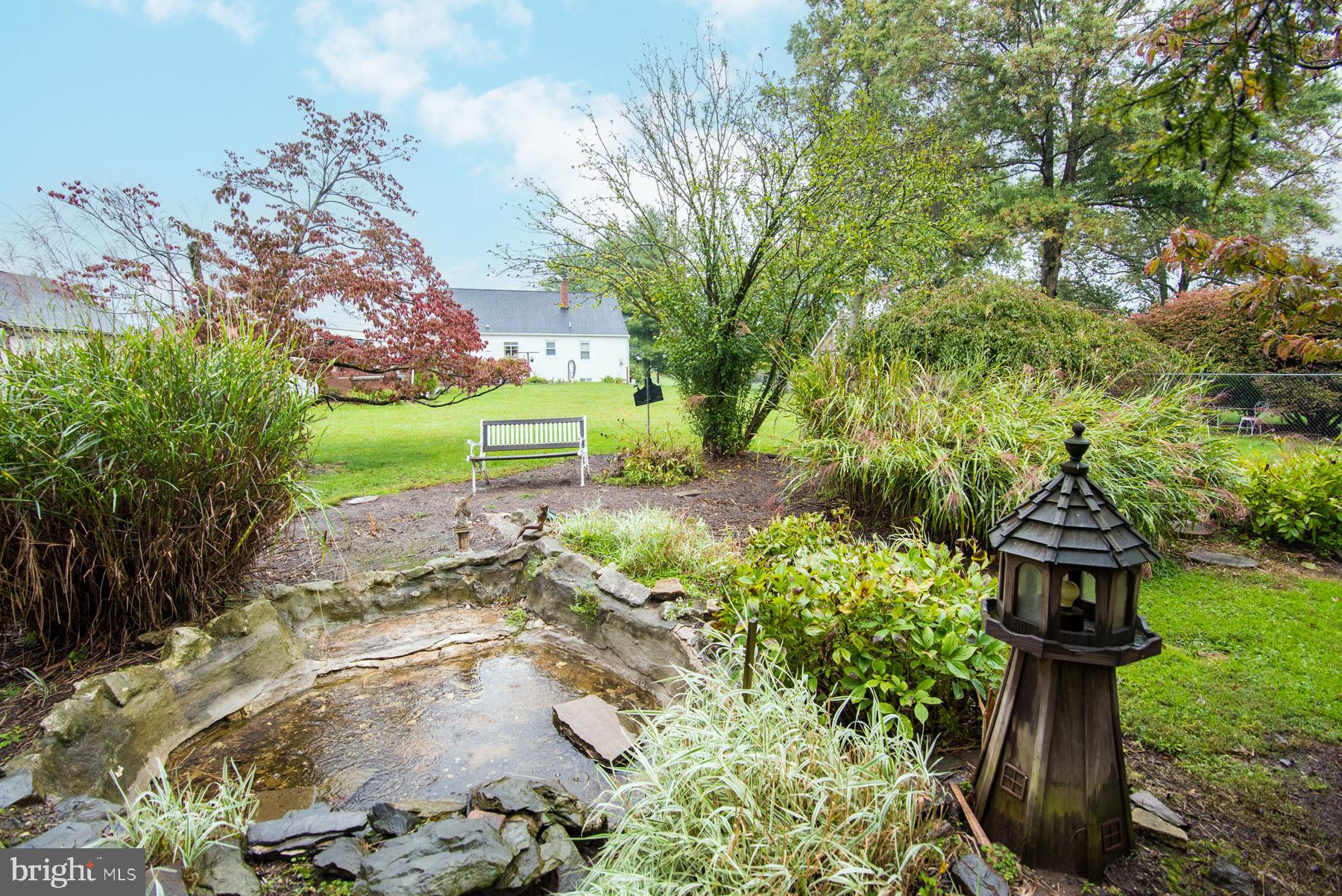 906 Township Line Road Phoenixville, PA 19460 - Photo 36 of 41 Backyard pond