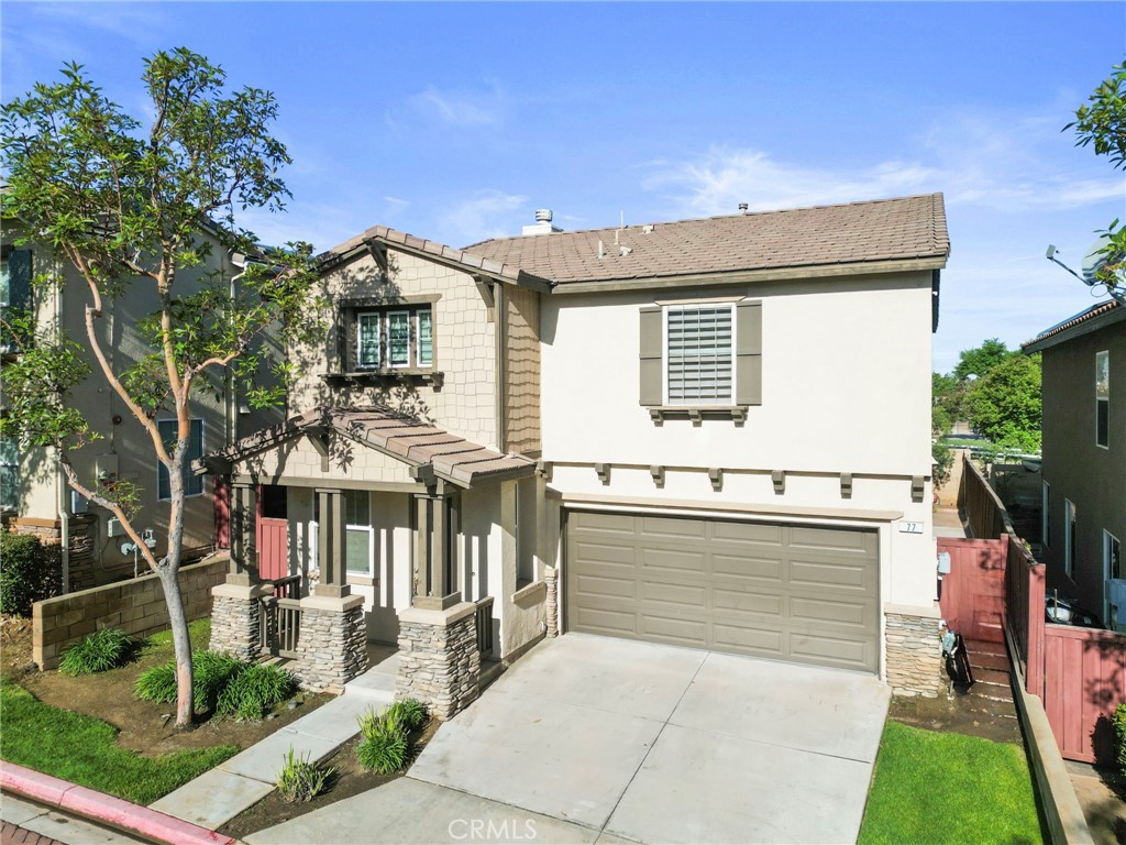 77 Crocus Street Redlands, CA 92373 - Photo 1 of 1 a front view of house with yard