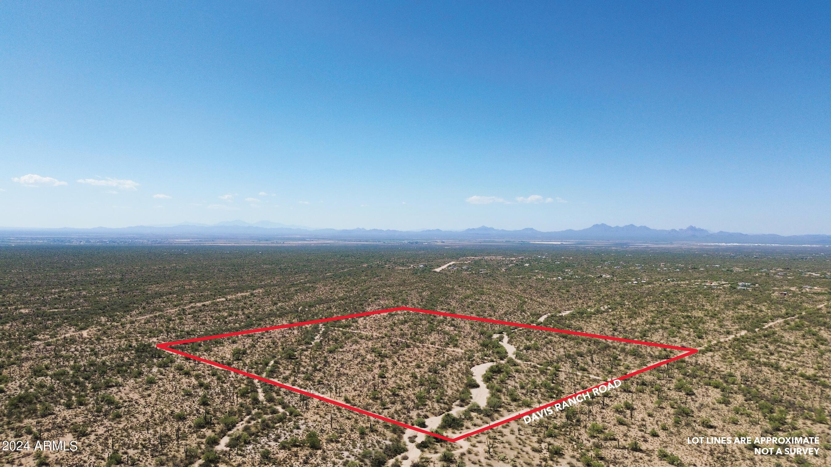 40-acres South Davis Ranch Road Marana, AZ 85658 - Photo 11 of 11 a view of a lake with a mountain