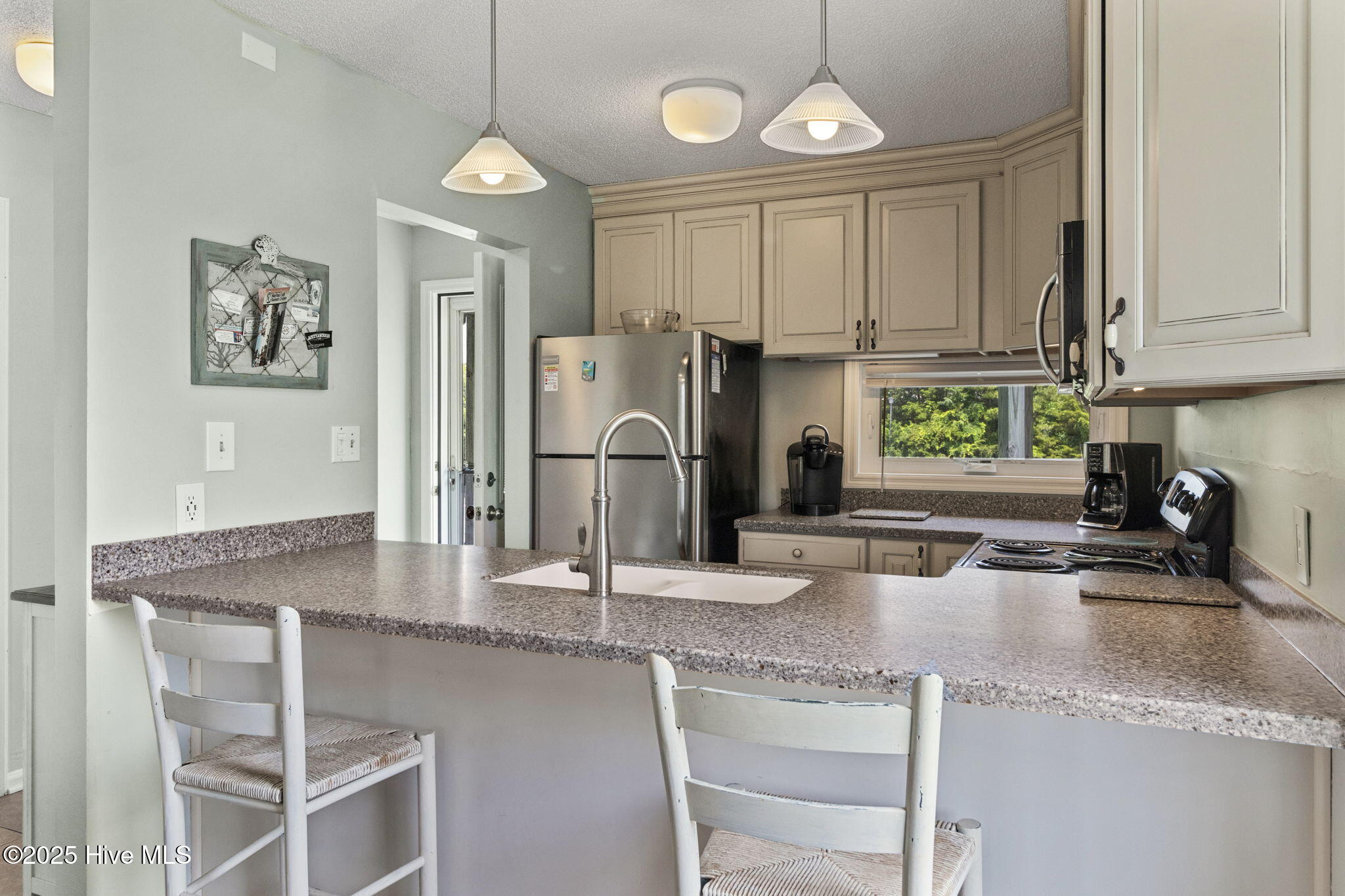 8801 Reed Drive, Unit 105N Emerald Isle, NC 28594 - Photo 4 of 37 Kitchen Bar