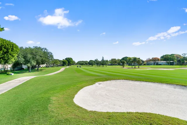 a bathroom with a shower and a toilet