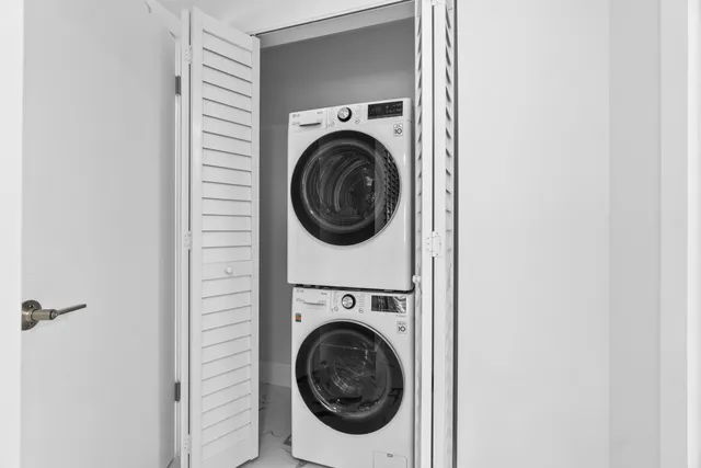 an aerial view of a house with garden space and street view