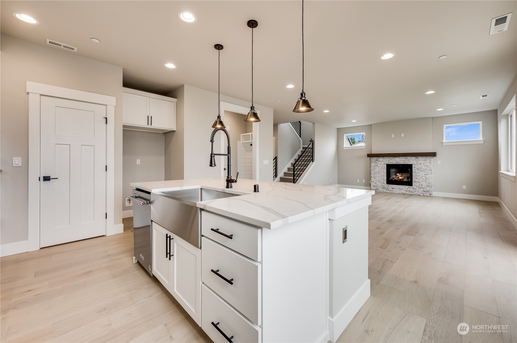 4439 244th Street Southeast Bothell, WA 98021 - Photo 17 of 29 a kitchen with kitchen island a sink stove and refrigerator