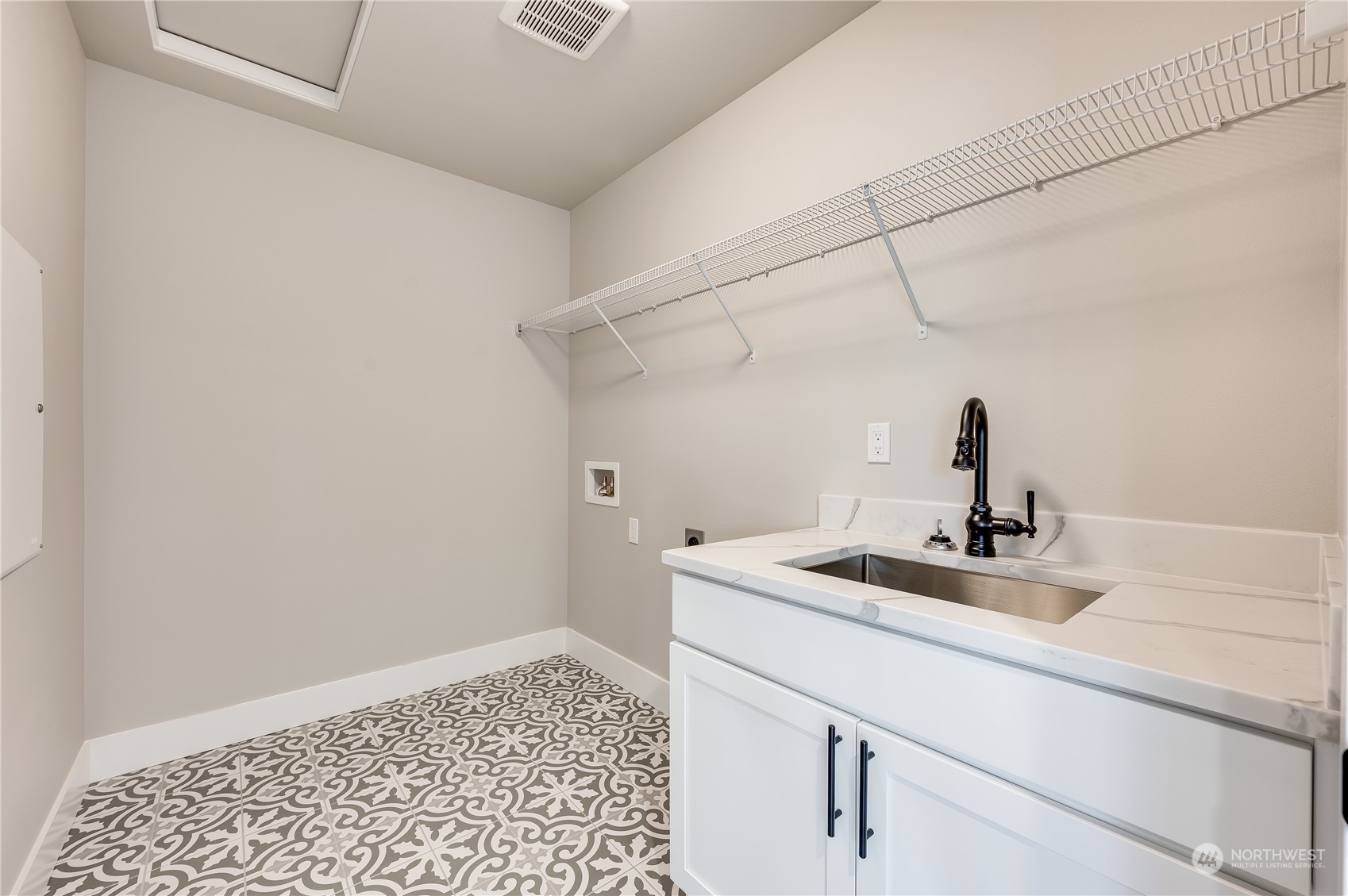 4439 244th Street Southeast Bothell, WA 98021 - Photo 20 of 29 a close view of sink and tap
