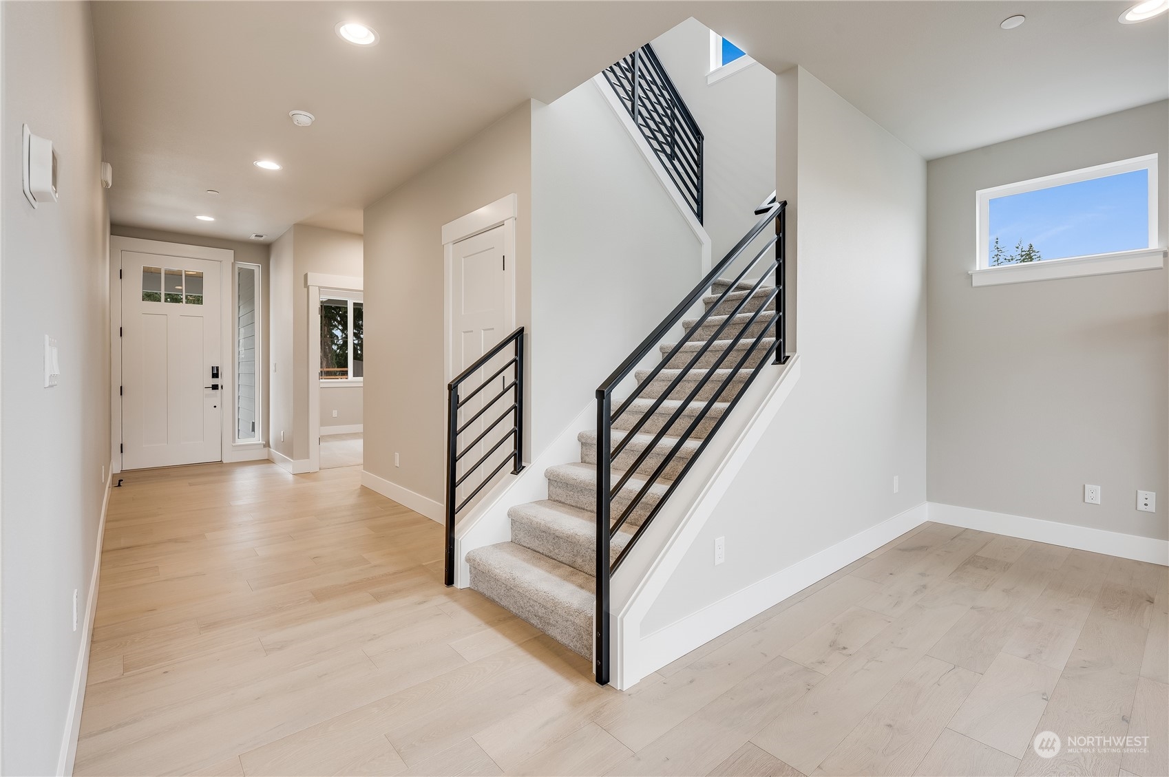 4439 244th Street Southeast Bothell, WA 98021 - Photo 4 of 29 a view of entryway and hall