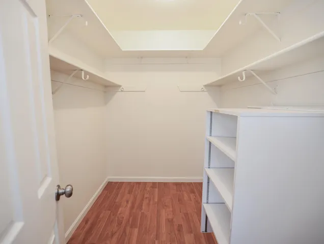 a view of swimming pool with outdoor seating and plants