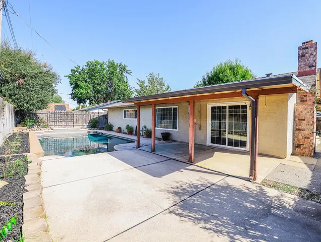 a house view with a outdoor space