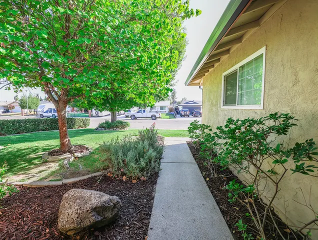 a view of a backyard with garden