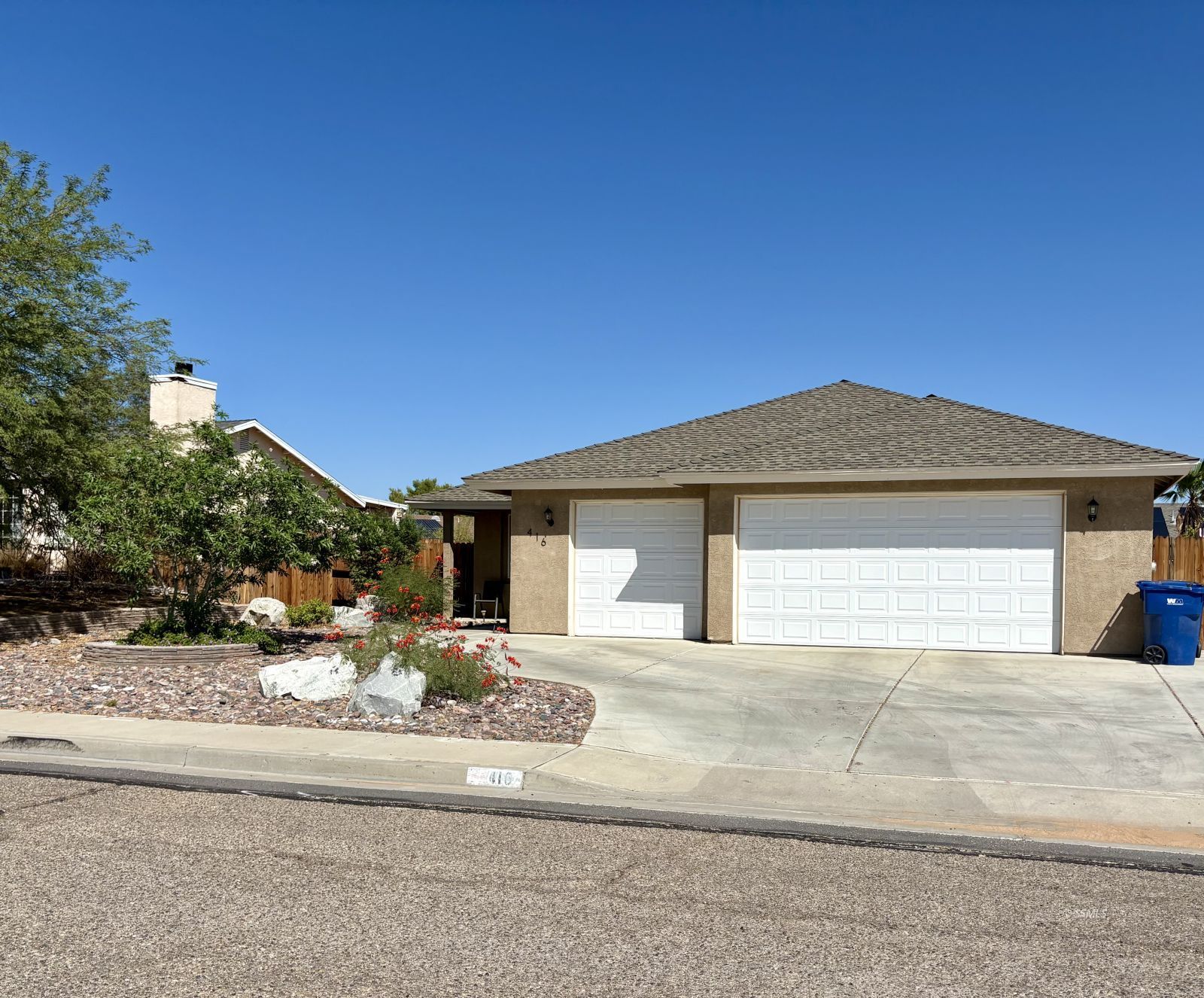 416 Olive Avenue Ridgecrest, CA 93555 - Photo 1 of 35 a front view of a house with a yard