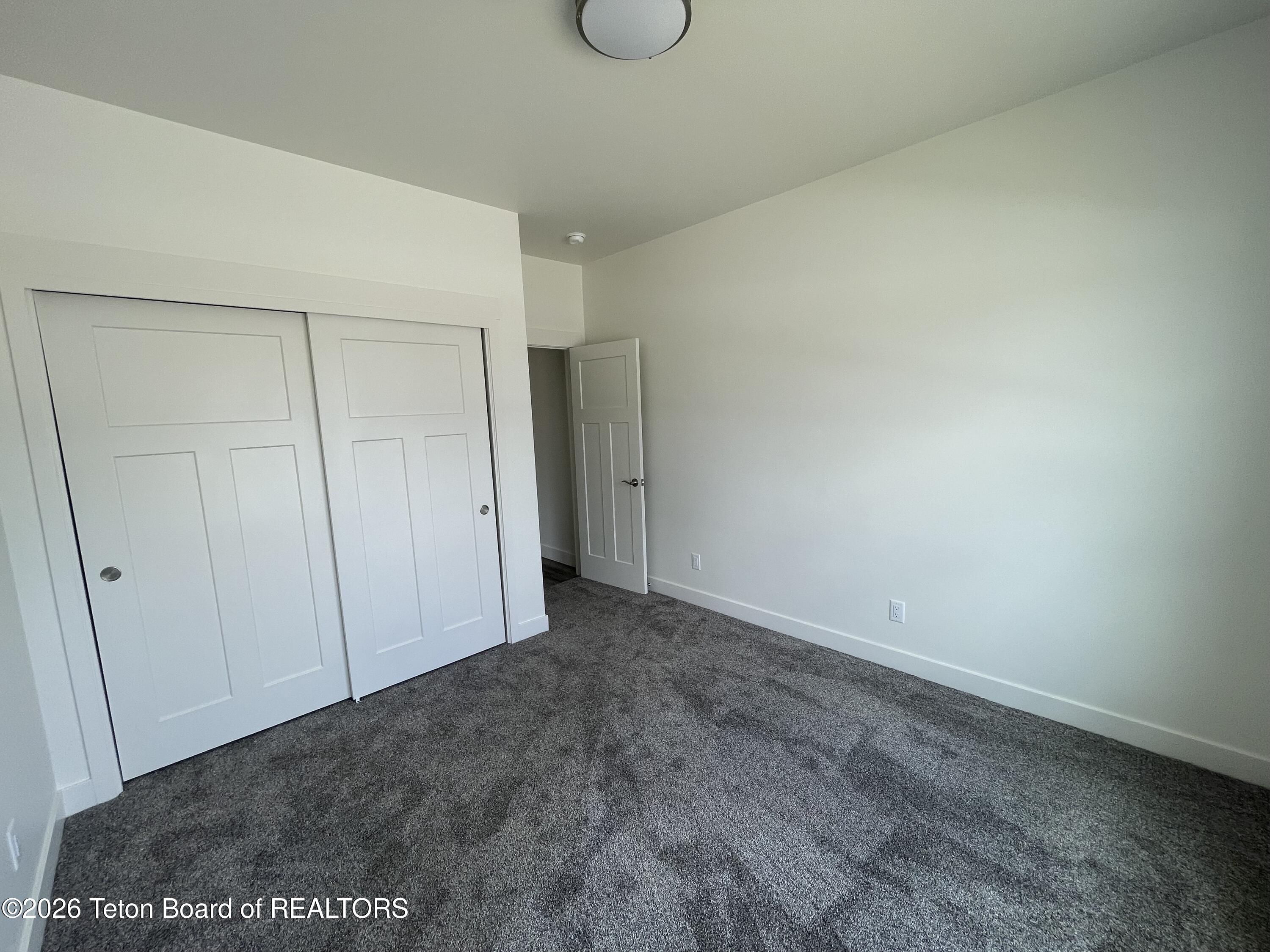1622 Wrangler Way Pinedale, WY 82941 - Photo 8 of 13 Guest Bedroom 1
