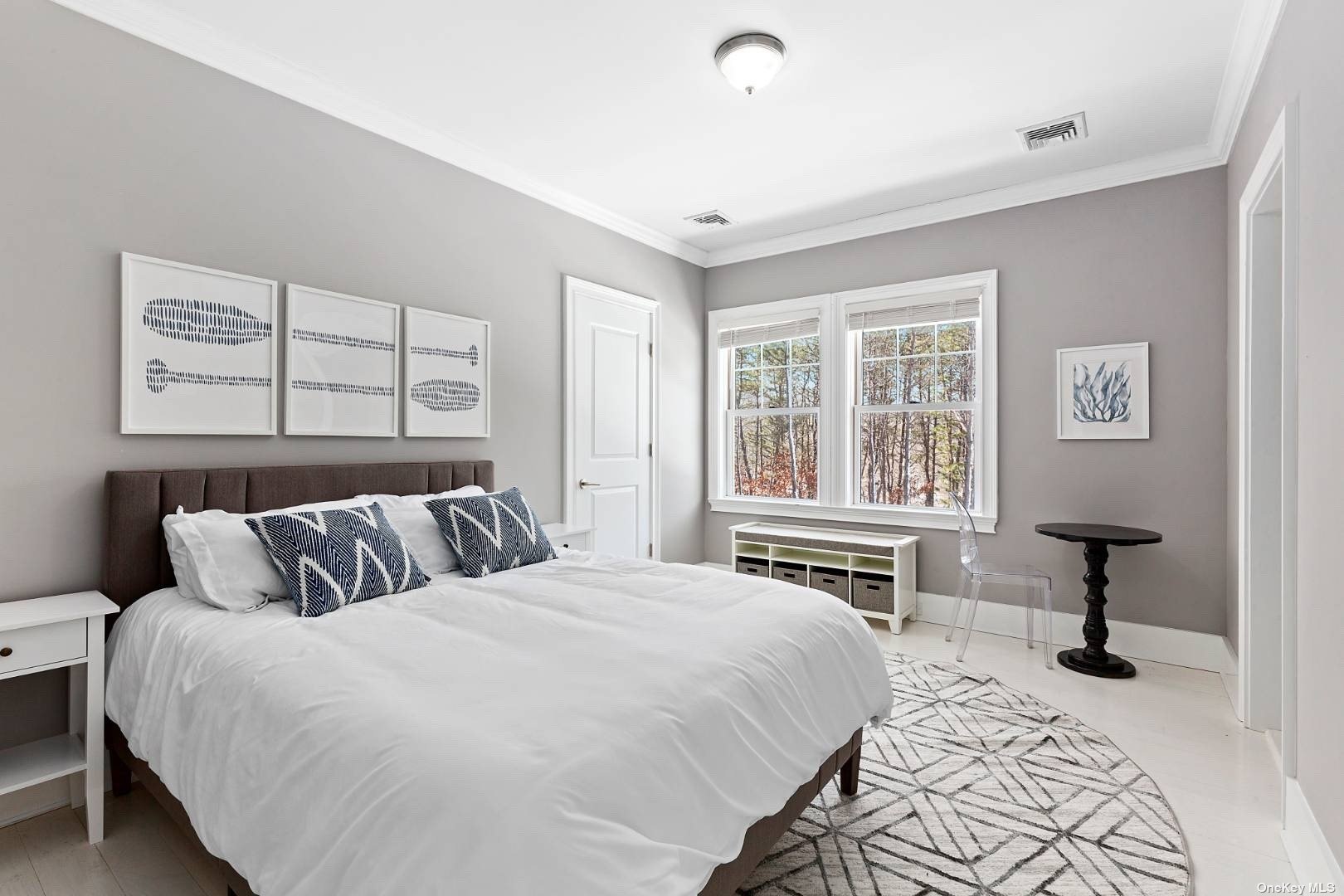 2 Westhampton, undefined 00000 - Photo 15 of 31 a bedroom with a bed and a table in it