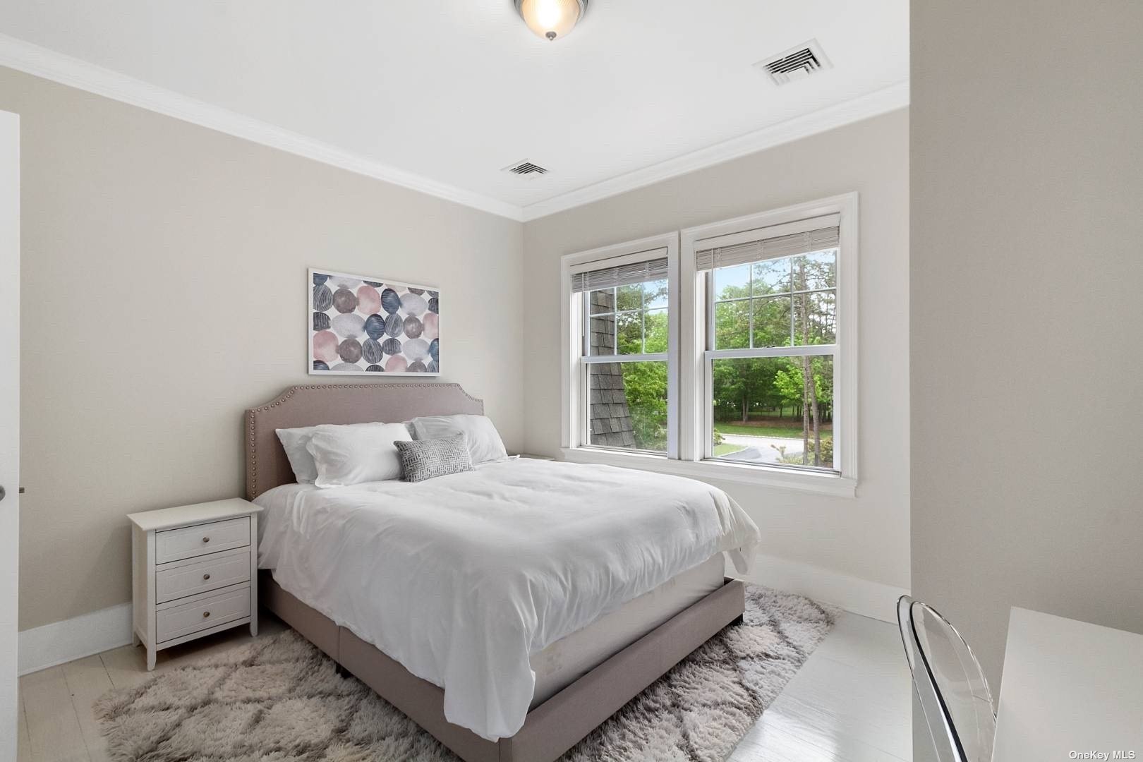 2 Westhampton, undefined 00000 - Photo 17 of 31 a bedroom with a bed and a large window