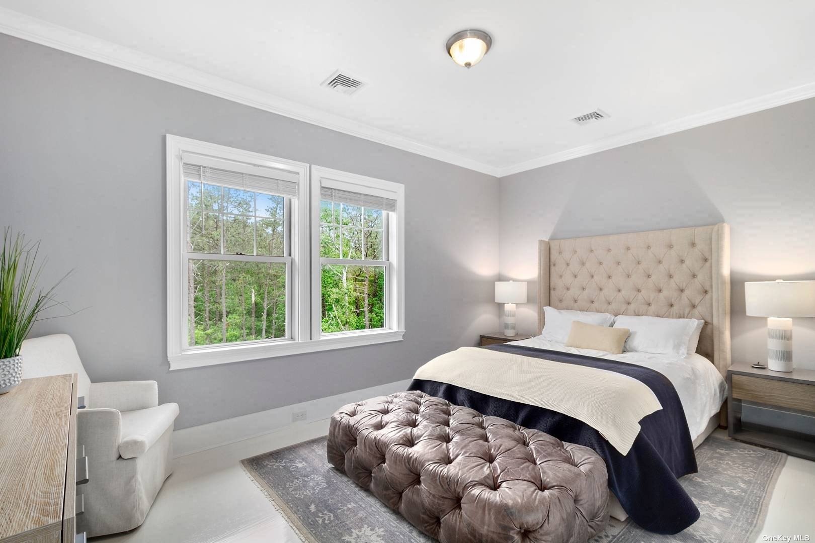 2 Westhampton, undefined 00000 - Photo 21 of 31 a bedroom with a bed and a couch