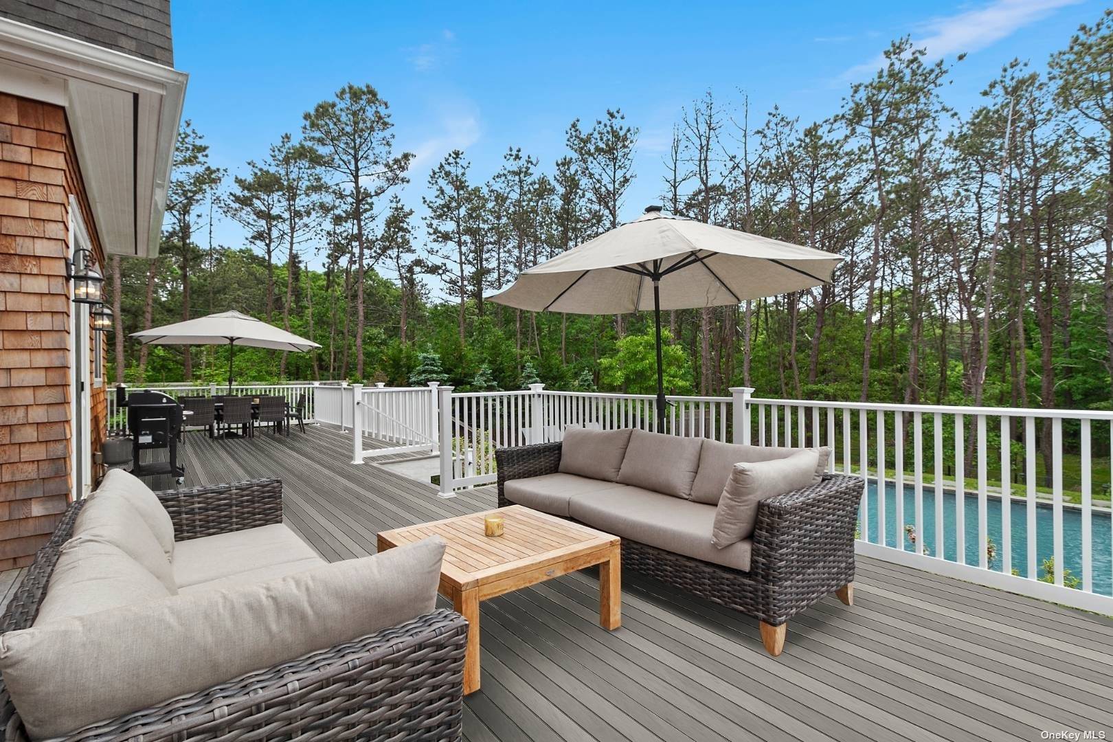 2 Westhampton, undefined 00000 - Photo 25 of 31 a view of a patio with couches table and chairs