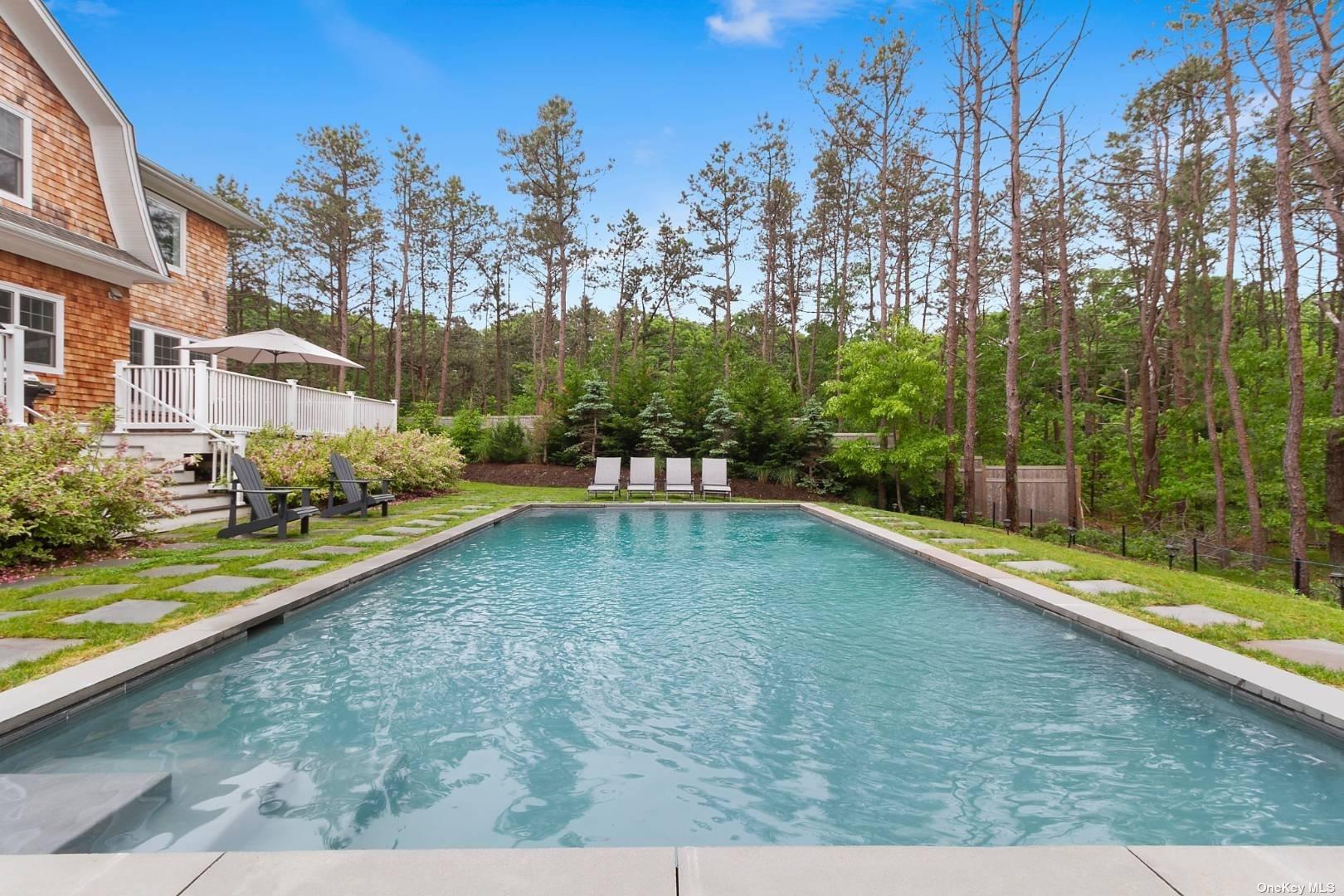 2 Westhampton, undefined 00000 - Photo 30 of 31 a view of a swimming pool with a patio