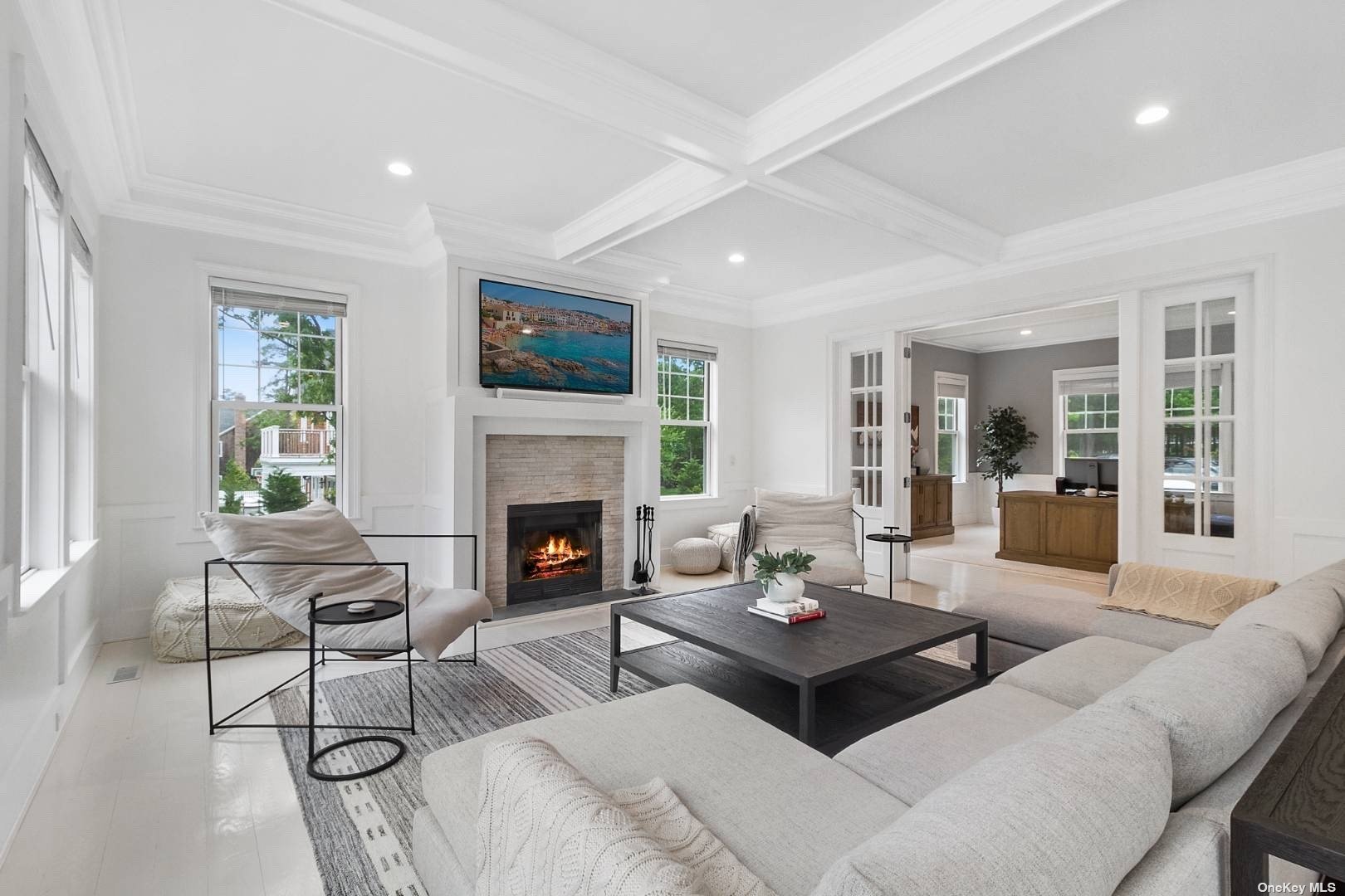 2 Westhampton, undefined 00000 - Photo 5 of 31 a living room with furniture a flat screen tv and a fireplace