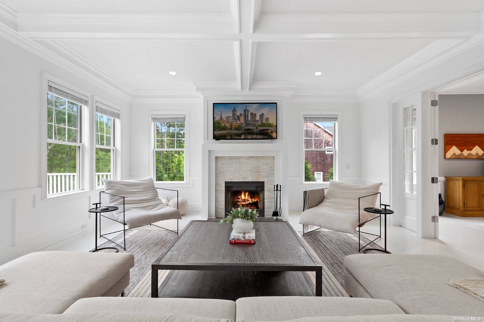 2 Westhampton, undefined 00000 - Photo 6 of 31 a living room with furniture a fireplace and a large window
