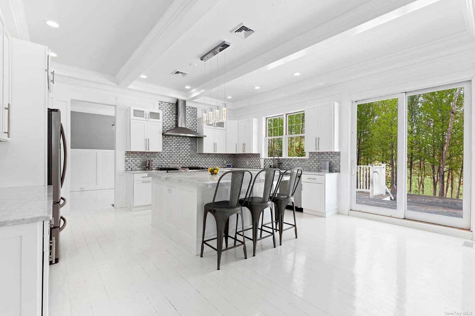 2 Westhampton, undefined 00000 - Photo 10 of 31 a kitchen with stainless steel appliances granite countertop a refrigerator and microwave