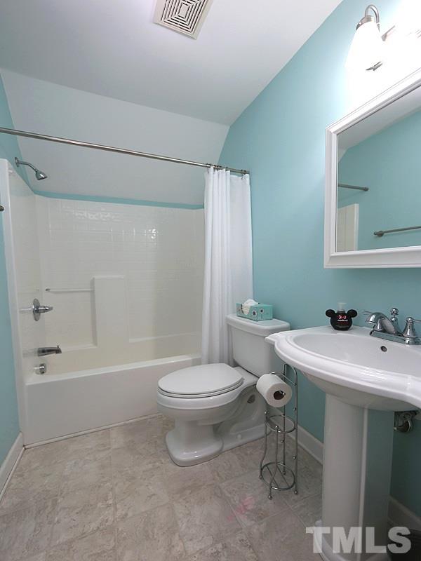 130 Russell Union Road Norlina, NC 27563 - Photo 16 of 20 a bathroom with a sink toilet and shower