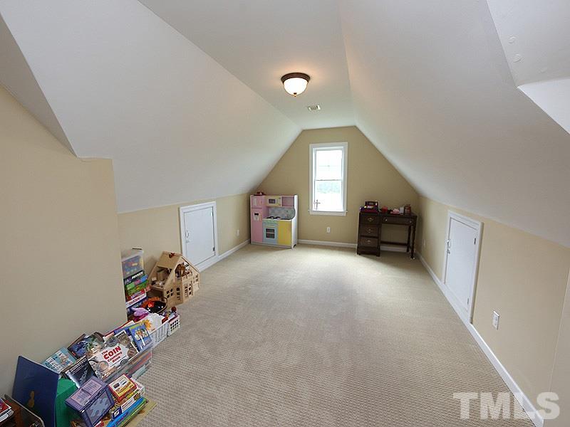 130 Russell Union Road Norlina, NC 27563 - Photo 17 of 20 a view of a livingroom with toys and a ceiling fan