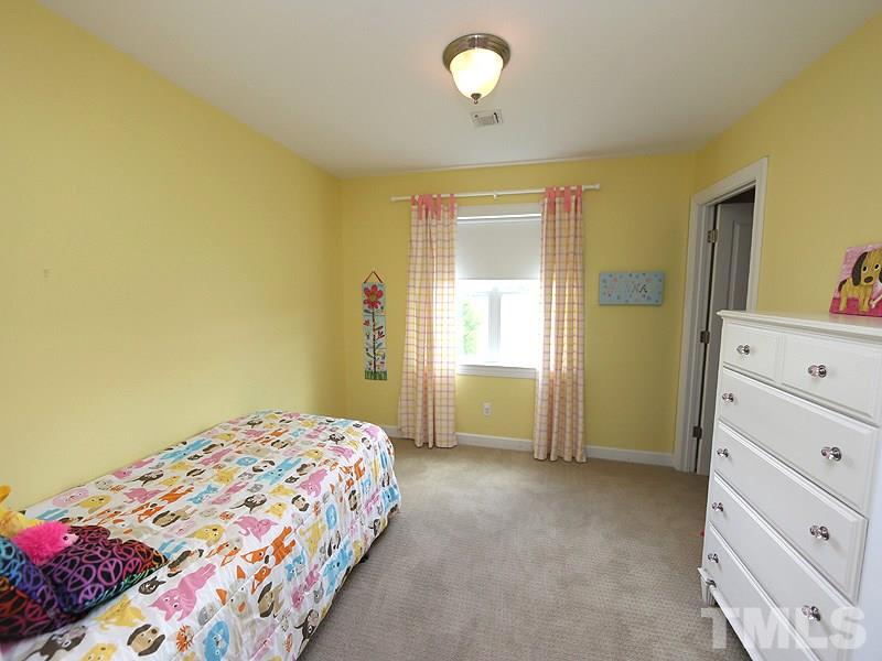 130 Russell Union Road Norlina, NC 27563 - Photo 18 of 20 a bedroom with a bed and a dresser