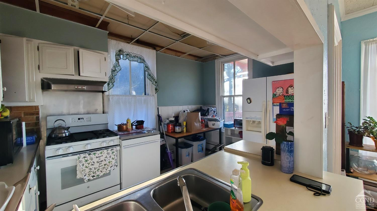 109 Summit Avenue Catskill, NY 12414 - Photo 5 of 12 a kitchen with lots of counter top space and cabinets