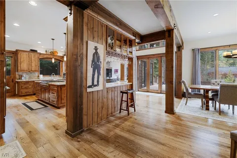 a view of living room with granite countertop furniture and a flat screen tv
