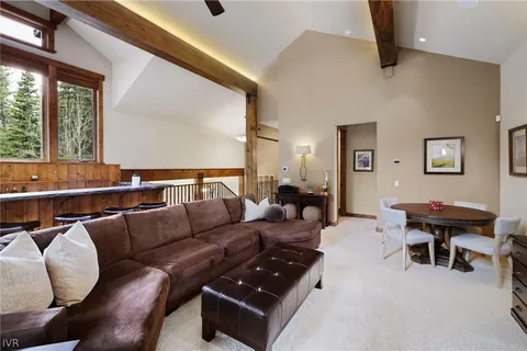 a bathroom with a shower sink and mirror
