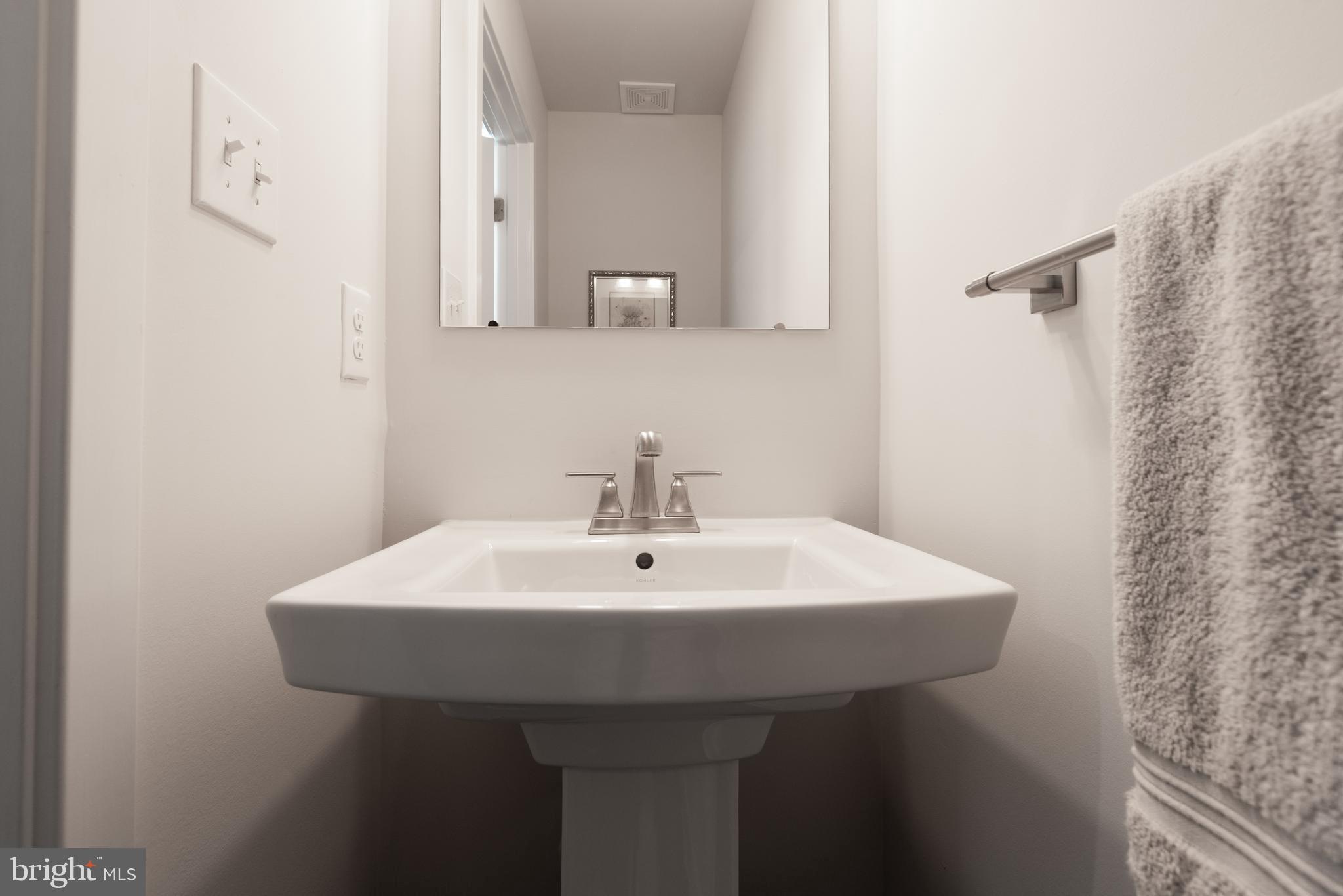 627 Quarry Point Road Malvern, PA 19355 - Photo 13 of 24 a white sink sitting next to a white sink