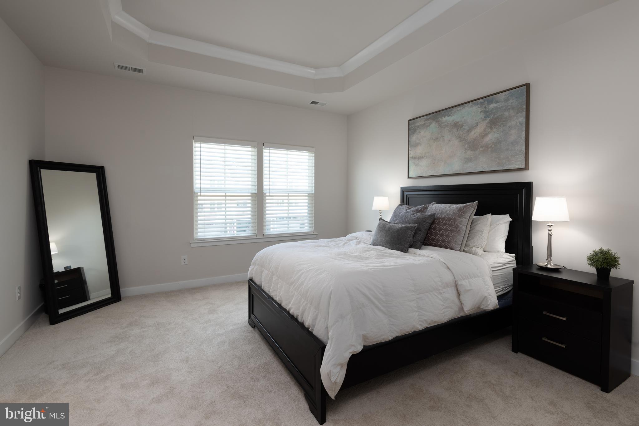 627 Quarry Point Road Malvern, PA 19355 - Photo 15 of 24 a bed sitting in a bedroom next to a window