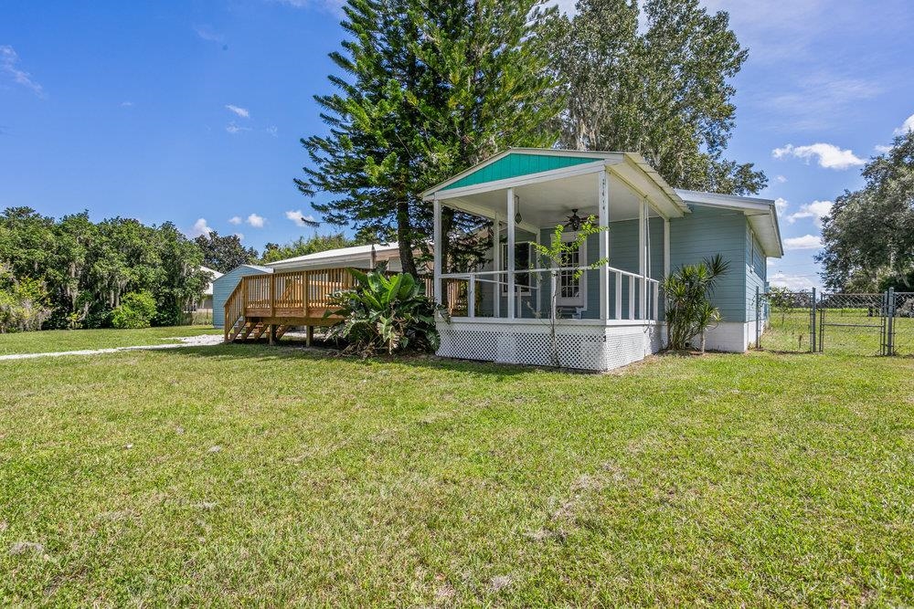 137 Mays Cove Road East Palatka, FL 32131 - Photo 39 of 70 a front view of a house with garden
