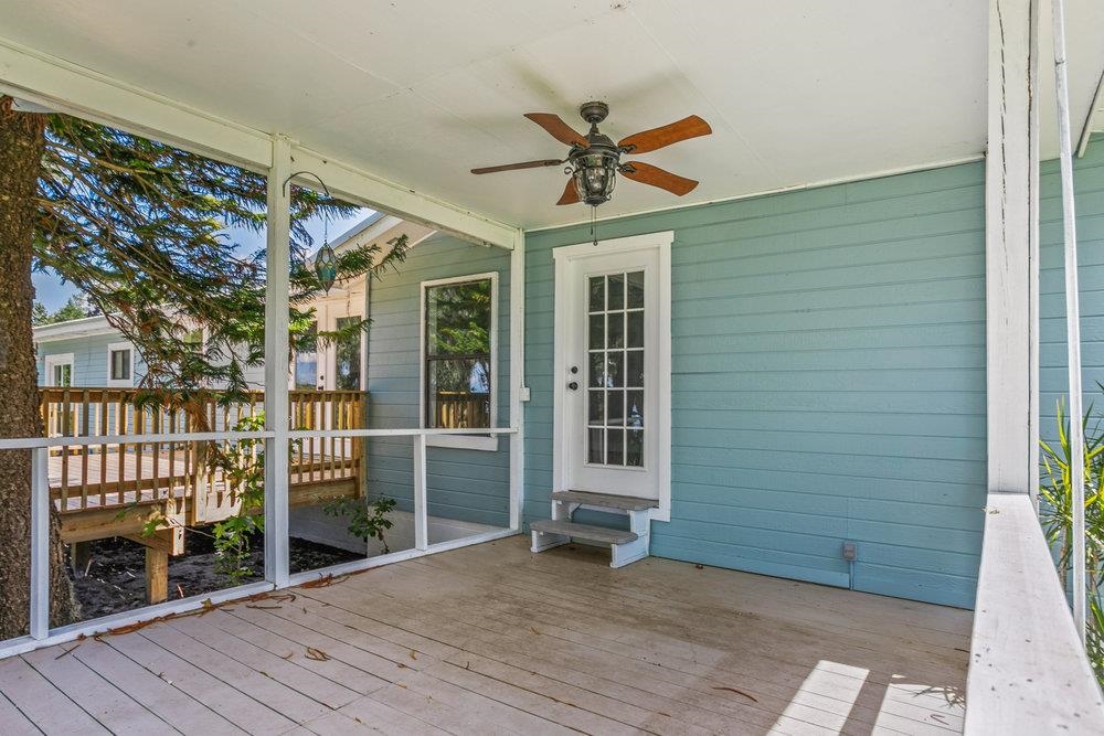 137 Mays Cove Road East Palatka, FL 32131 - Photo 40 of 70 a view of a house with a porch