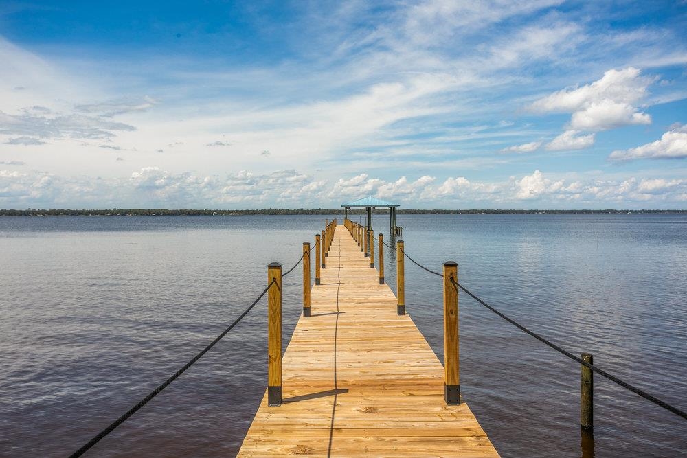 137 Mays Cove Road East Palatka, FL 32131 - Photo 45 of 70 a view of wooden floor and a lake