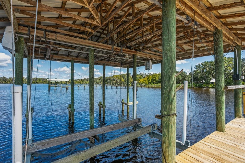 137 Mays Cove Road East Palatka, FL 32131 - Photo 48 of 70 a view of a balcony with wooden floor