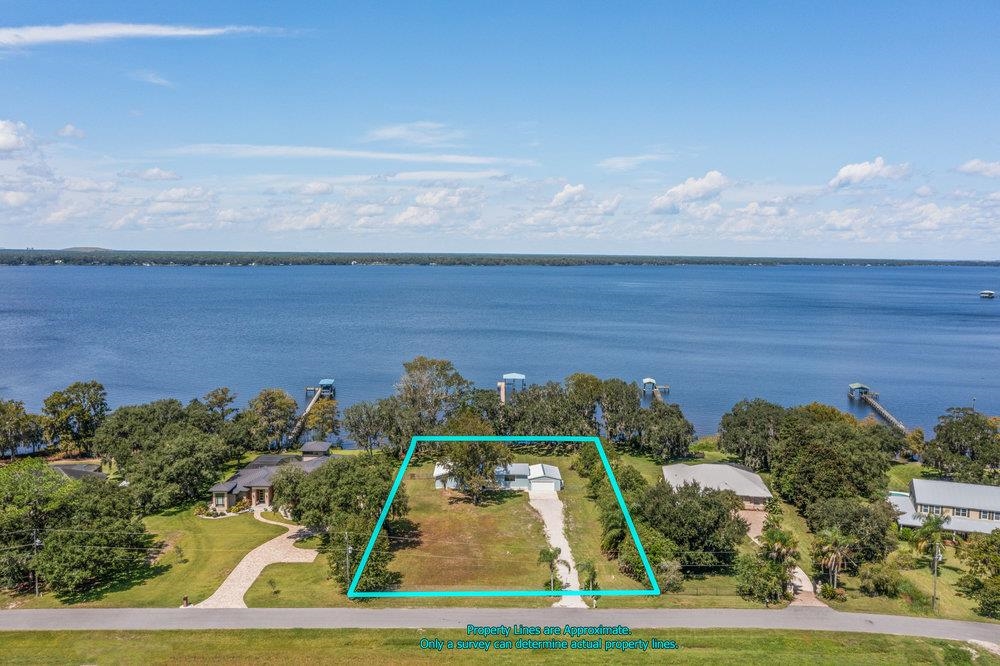 137 Mays Cove Road East Palatka, FL 32131 - Photo 52 of 70 a view of a yard with an outdoor space