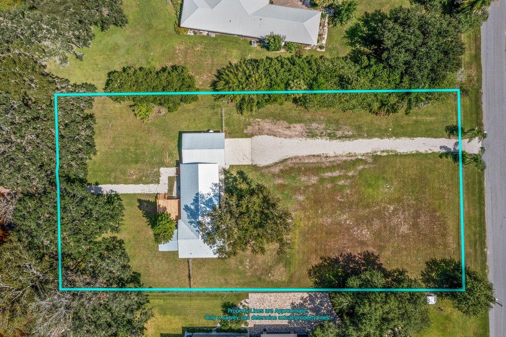 137 Mays Cove Road East Palatka, FL 32131 - Photo 56 of 70 an aerial view of a house with a yard